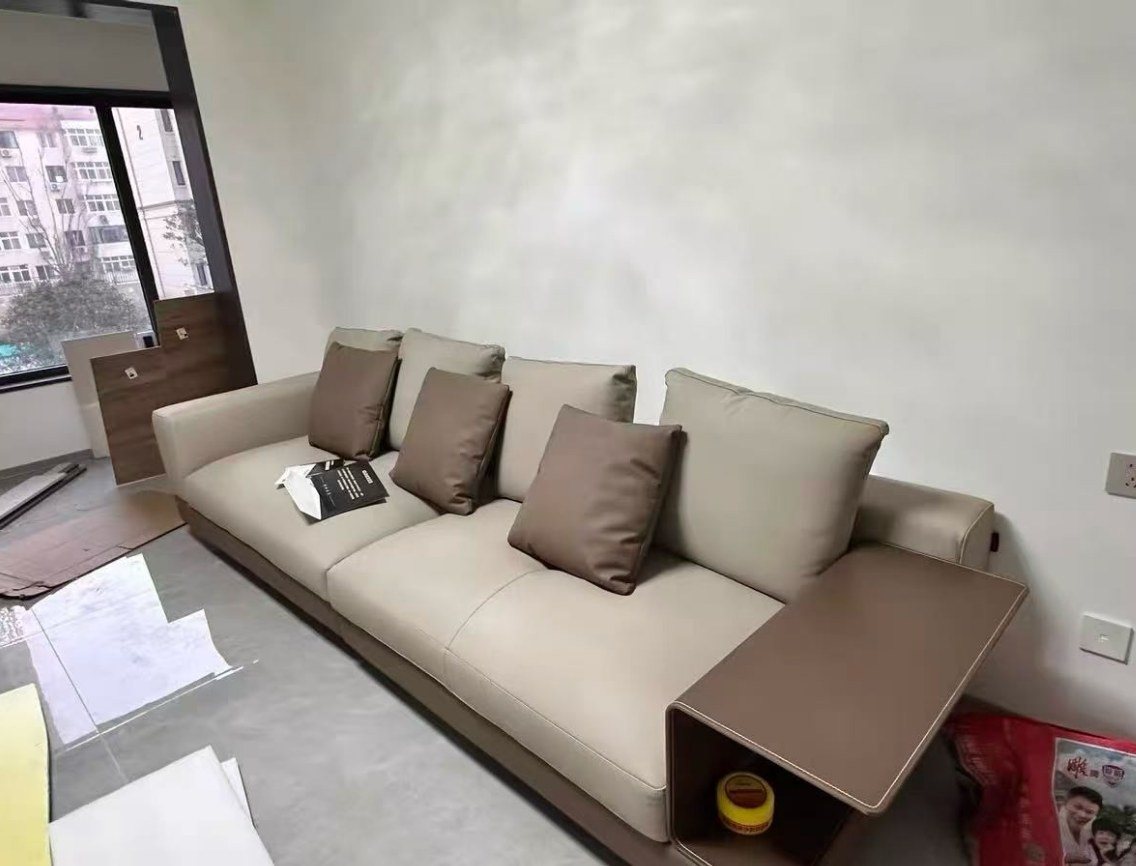 Beige fabric sofa set delivered into a residential living room